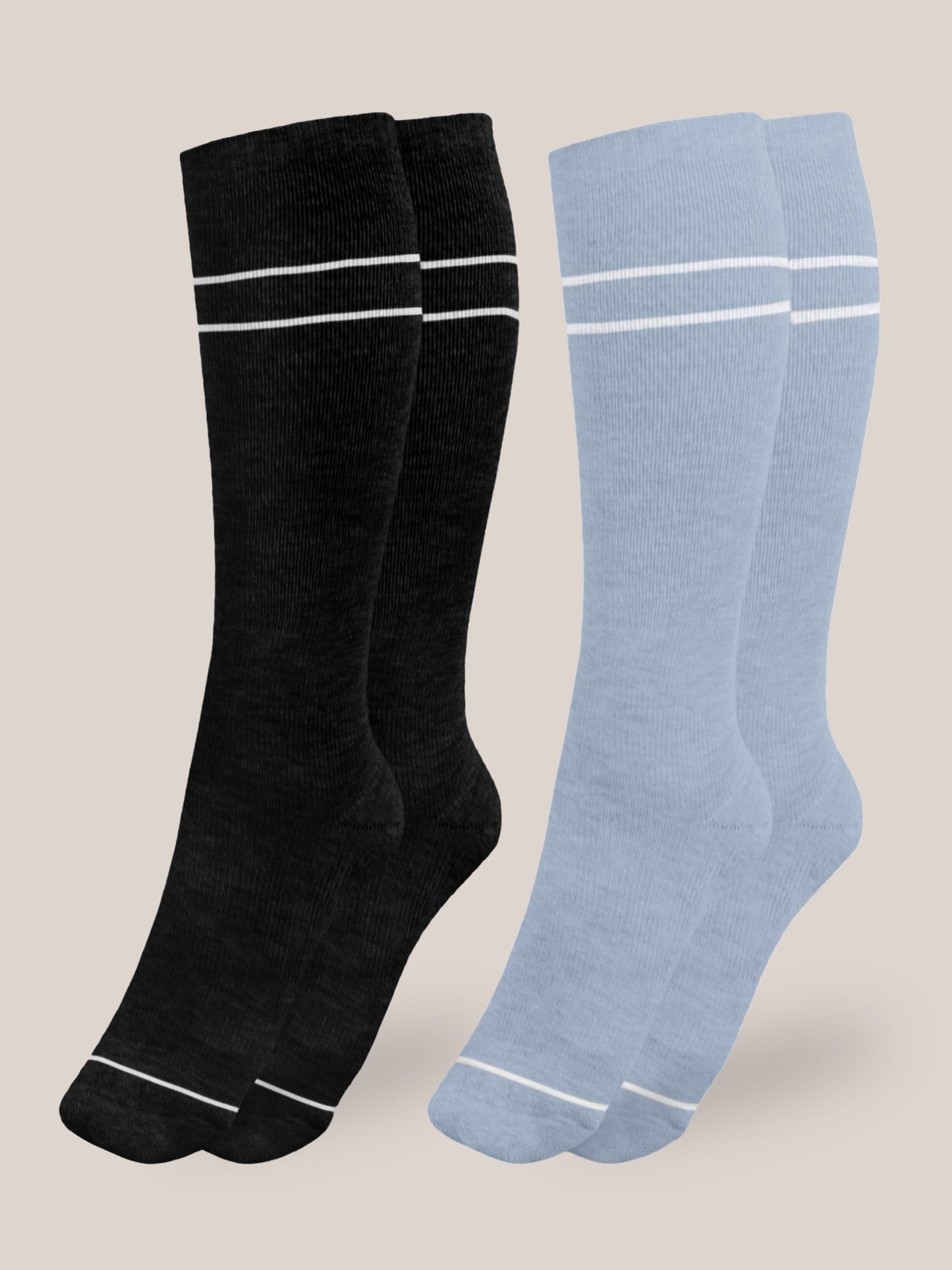 Pair of Kindred Bravely premium maternity compression socks in stone blue and black, designed for comfortable support during pregnancy.
