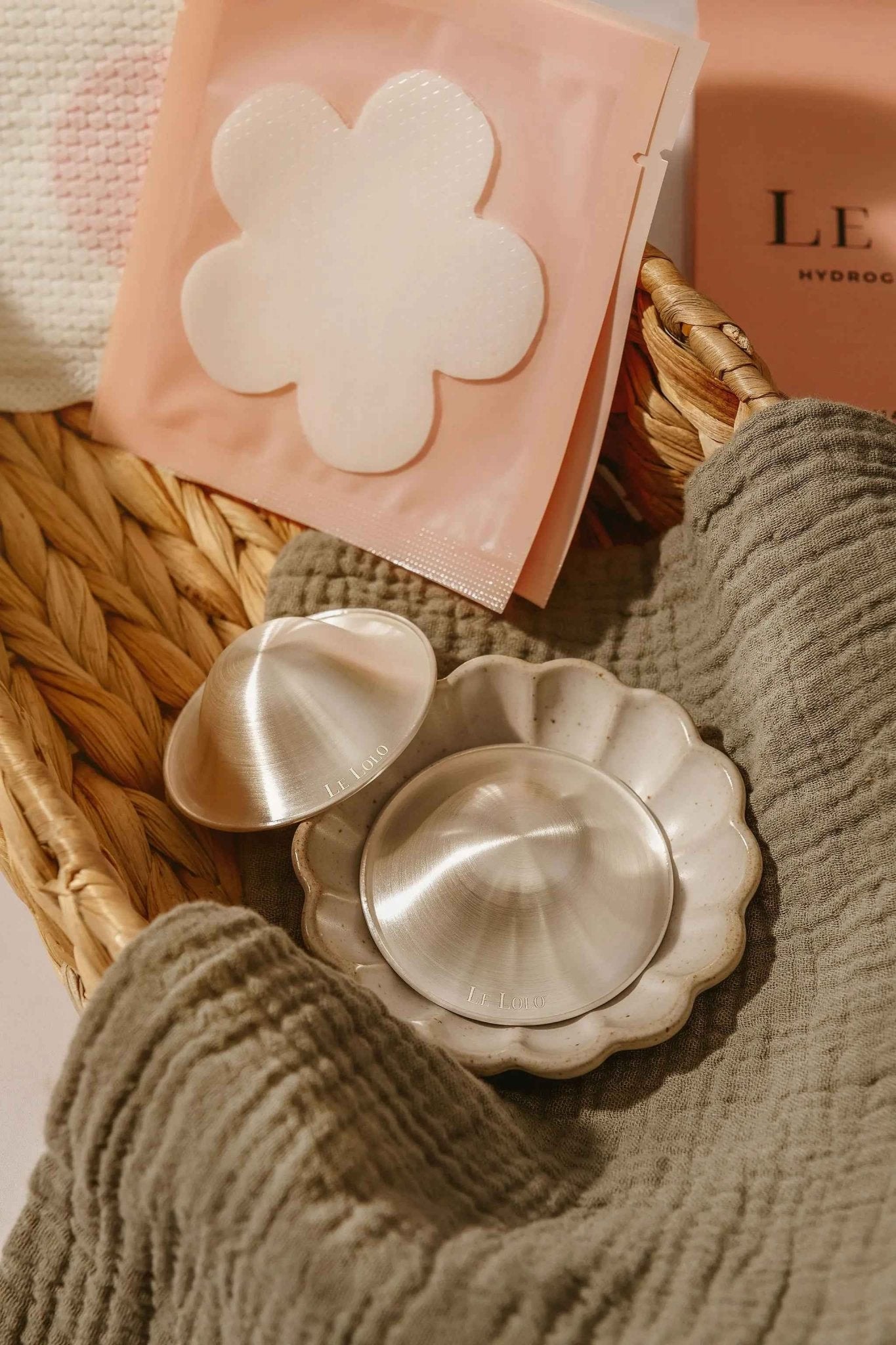 Le Lolo 999 Silver Nursing Cups displayed with intricate engraved designs and polished finish, showcasing traditional craftsmanship.