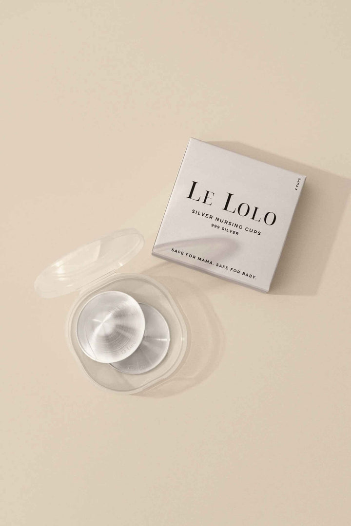 Le Lolo 999 Silver Nursing Cups set with intricate engraved designs, showcasing traditional handcrafted silver craftsmanship.