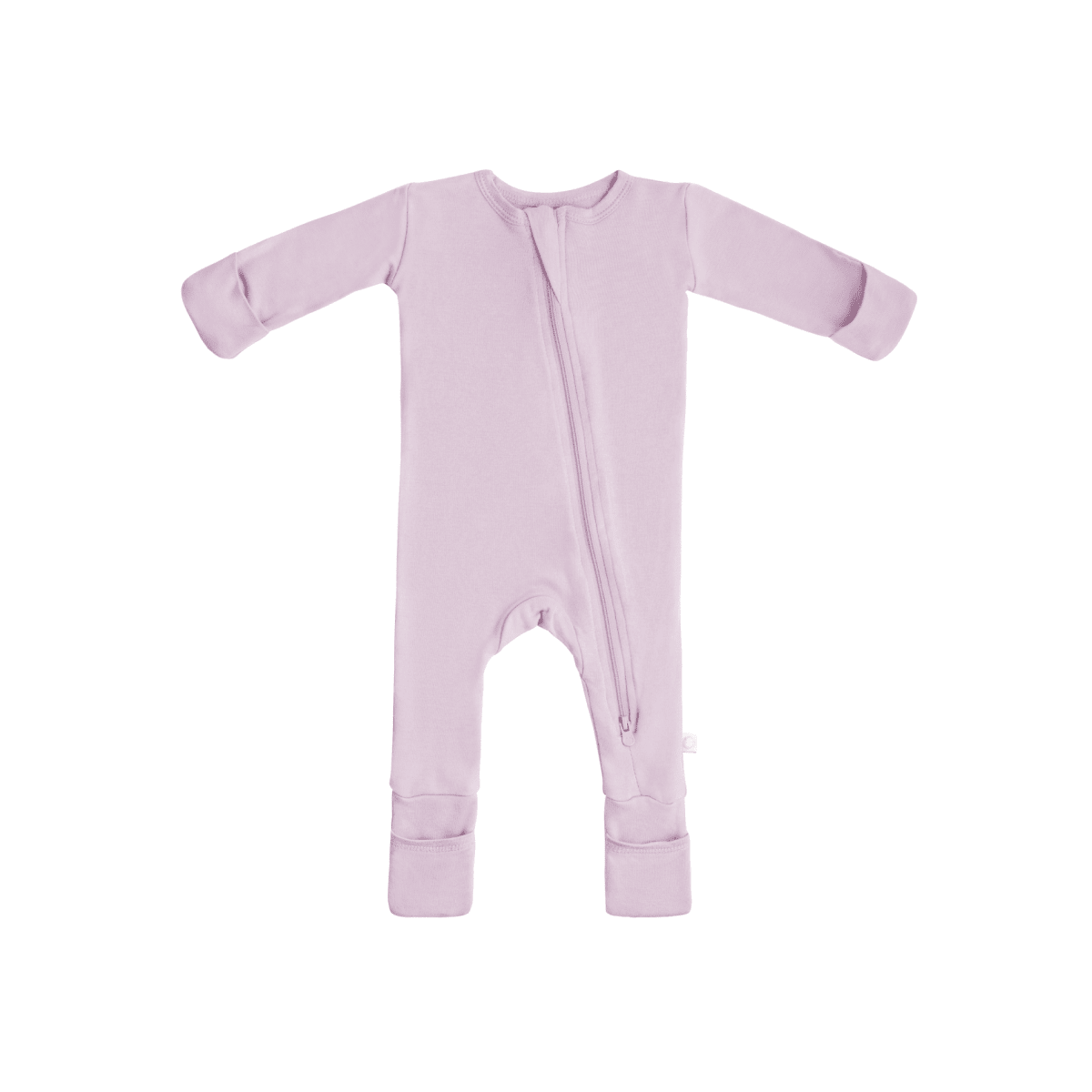 Baby in soft bamboo pajamas with DreamCuffs® from Dreamland Baby, featuring cozy footed design and gentle fabric.