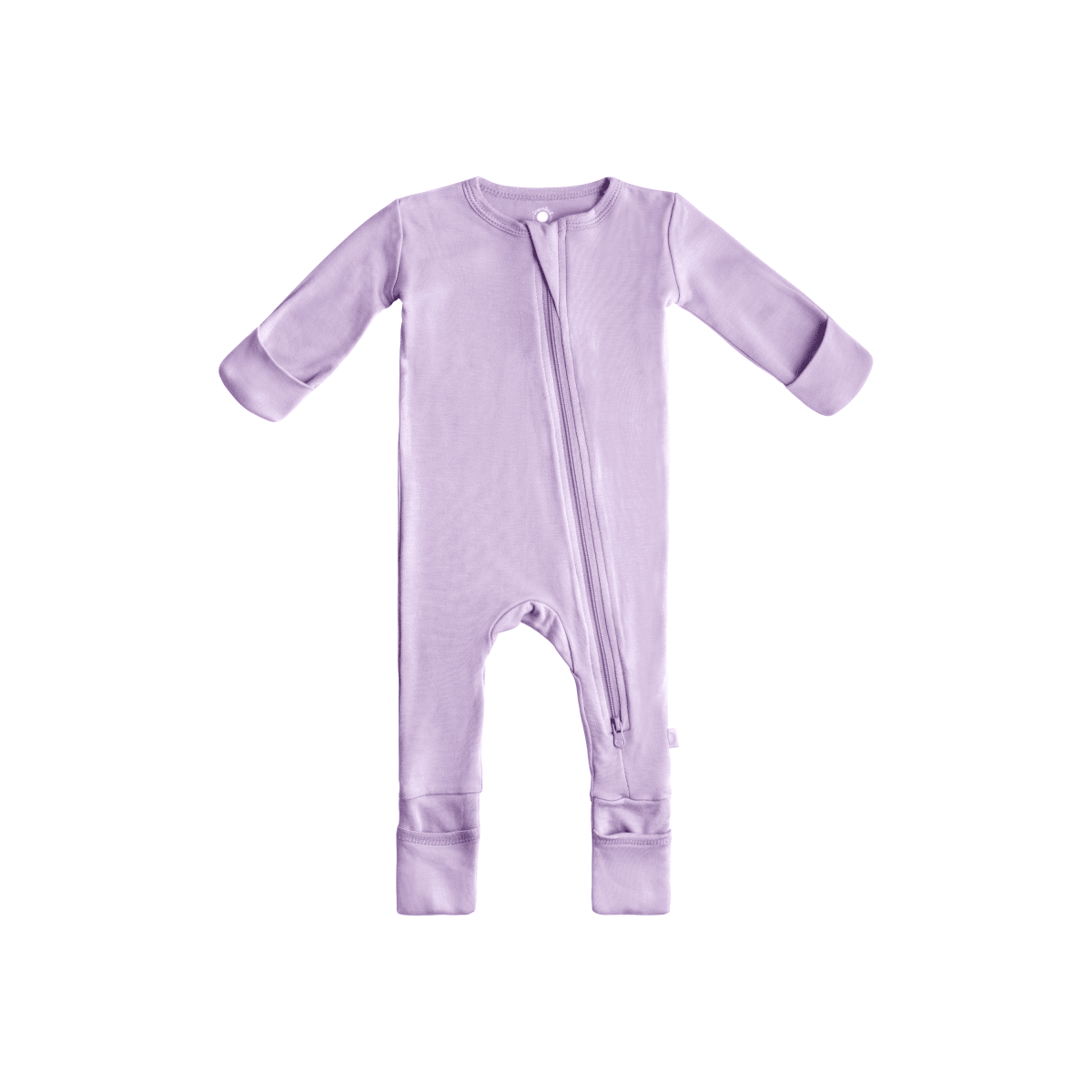 Baby in soft bamboo pajamas with DreamCuffs® from Dreamland Baby, featuring cozy footed design and gentle fabric for comfort.