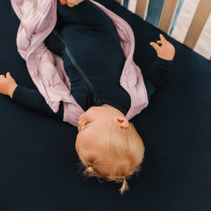 Baby Dreamland Baby bamboo pajamas with DreamCuffs® featuring soft fabric and cozy design for comfortable sleep.