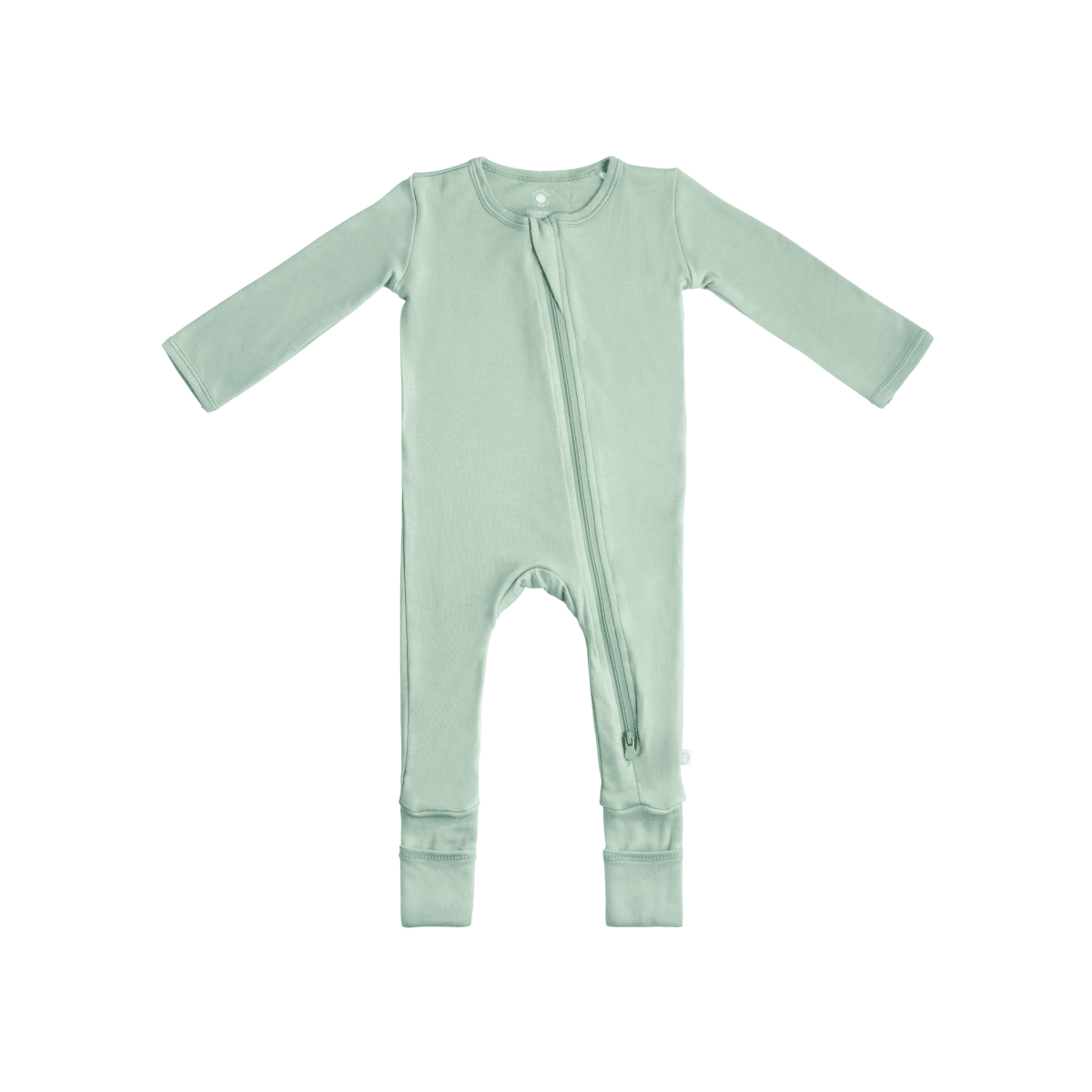Baby wearing Dreamland Baby Bamboo Pajamas with DreamCuffs®, soft fabric, and cozy design for comfortable sleep.