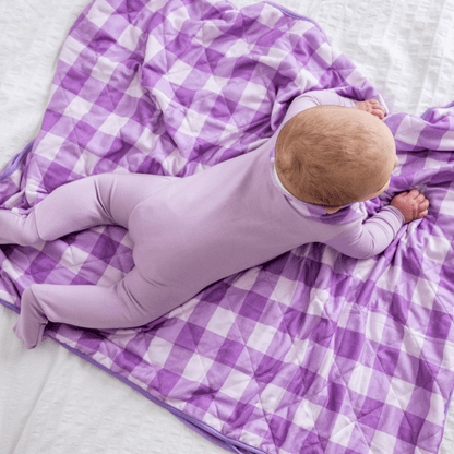 Baby in Dreamland Baby bamboo pajamas with DreamCuffs®, showing soft fabric and snug fit for comfort.