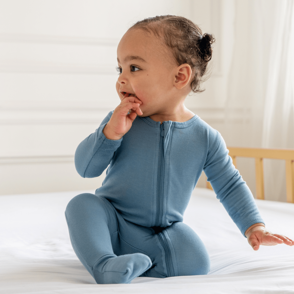 Baby Dreamland Baby bamboo pajamas with DreamCuffs® featuring soft fabric and adjustable cuffs for comfortable sleep.