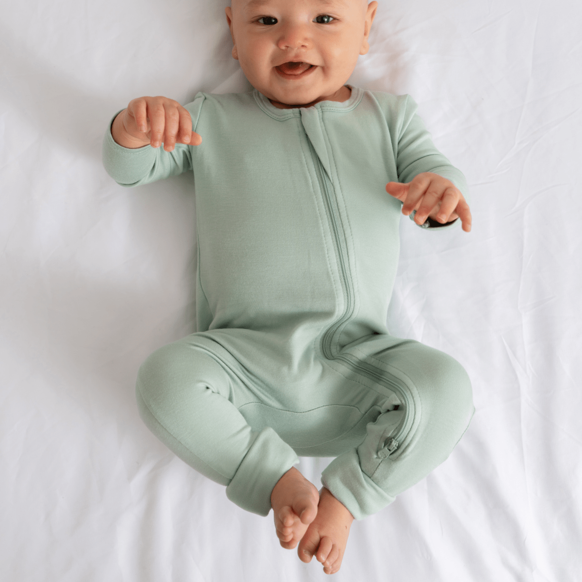 Baby Dreamland Baby bamboo pajamas with DreamCuffs®, featuring soft fabric and cozy design for comfortable sleep.