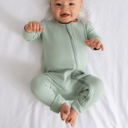 Baby Dreamland Baby bamboo pajamas with DreamCuffs®, featuring soft fabric and cozy design for comfortable sleep.