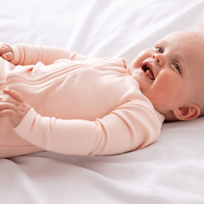 Baby Dreamland Baby bamboo pajamas with DreamCuffs®, featuring soft fabric and snug fit for comfort and safety.