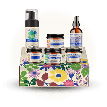 Baby care gift box from Motherlove Herbal Company featuring natural baby skincare products and essentials.