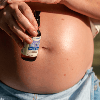 Baby birth and massage oil from Motherlove Herbal Company, featuring gentle, natural ingredients for newborn skin care.