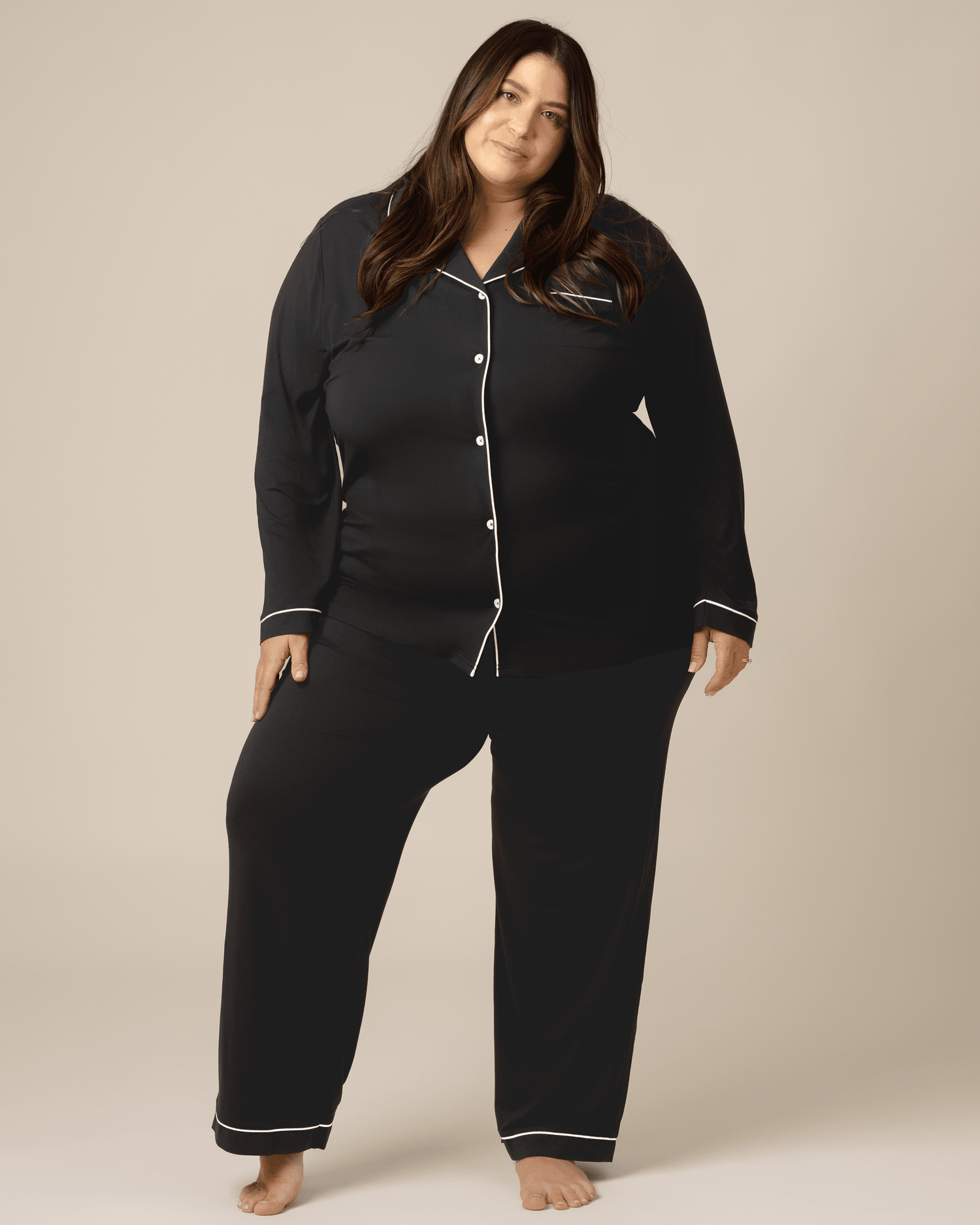 Black Clea Bamboo long sleeve pajama set by Kindred Bravely, featuring soft, comfortable fabric and relaxed fit for cozy nights.