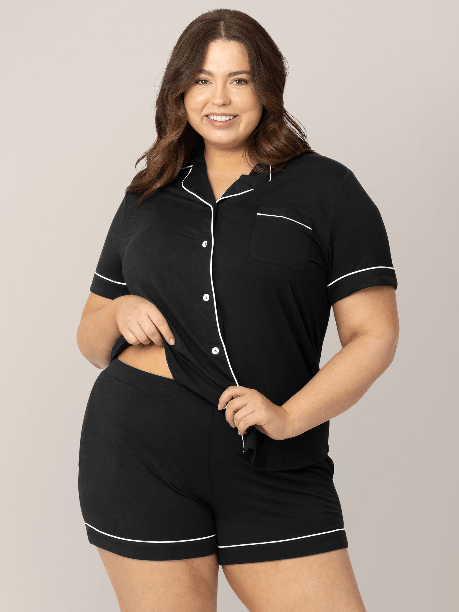 Black Clea Bamboo Short Sleeve Pajama Set by Kindred Bravely, featuring soft, comfortable short-sleeve tops and matching shorts.