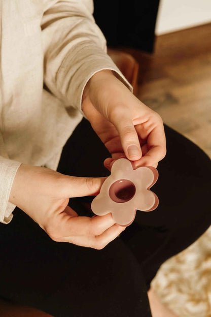Colored nipple shield system by Le Lolo featuring vibrant, soft silicone shields designed for comfort and discreet nipple coverage.