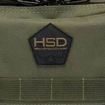 HSD HighSpeedDaddy diaper changing mat with soft padded surface and adjustable straps for comfortable baby care.
