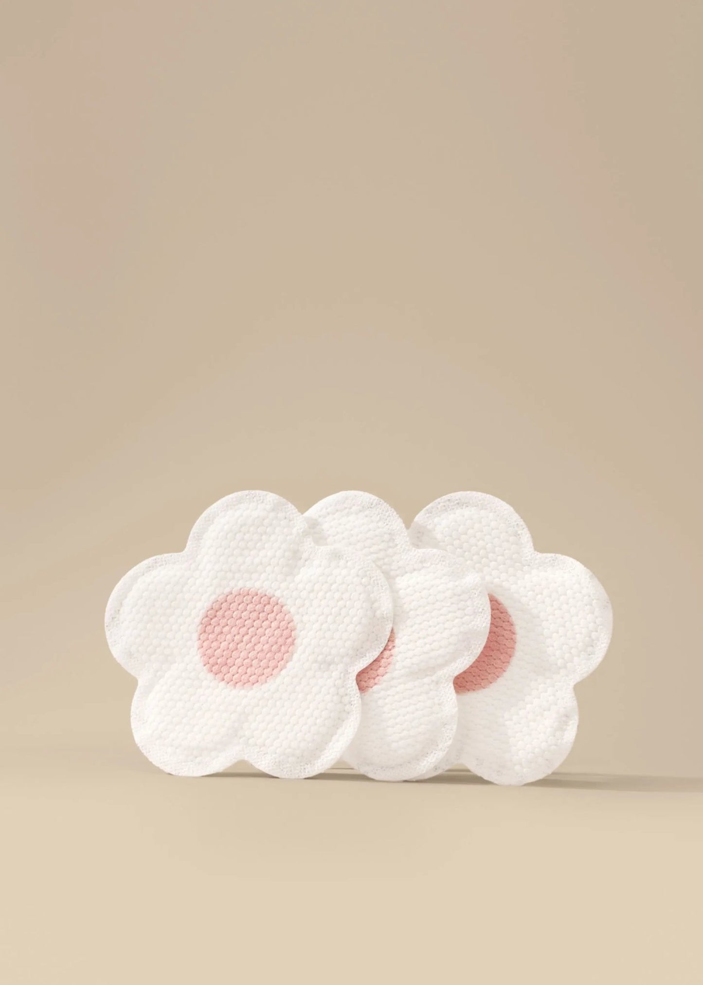 Disposable nursing pads by Le Lolo, soft absorbent pads for breastfeeding, shown in a close-up image.