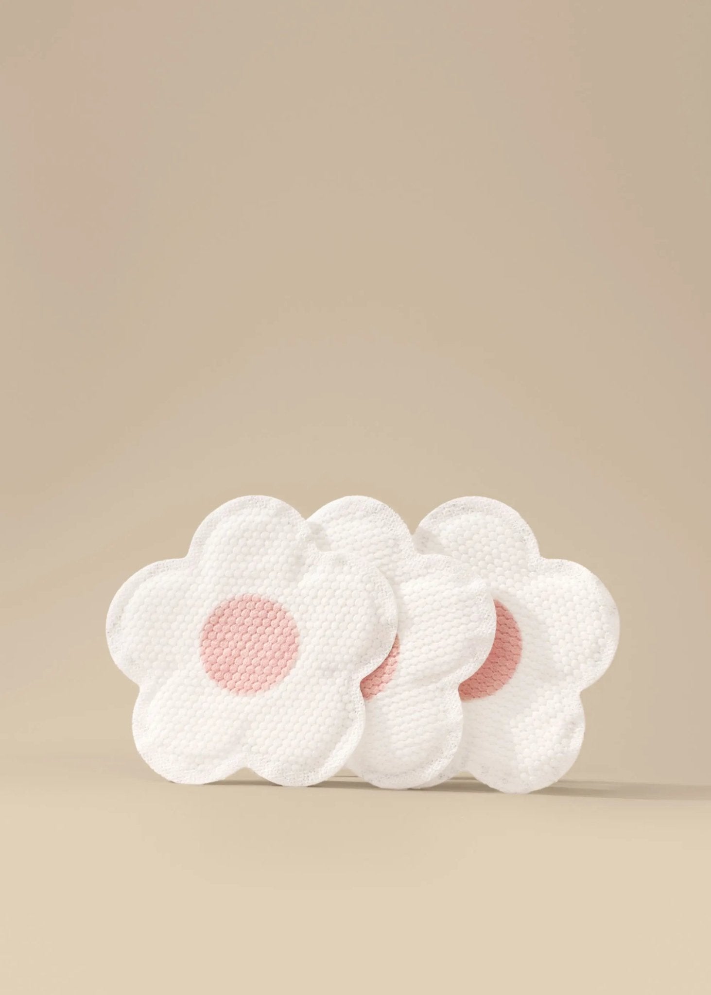 Disposable nursing pads by Le Lolo, soft absorbent pads for breastfeeding, shown in a close-up image.