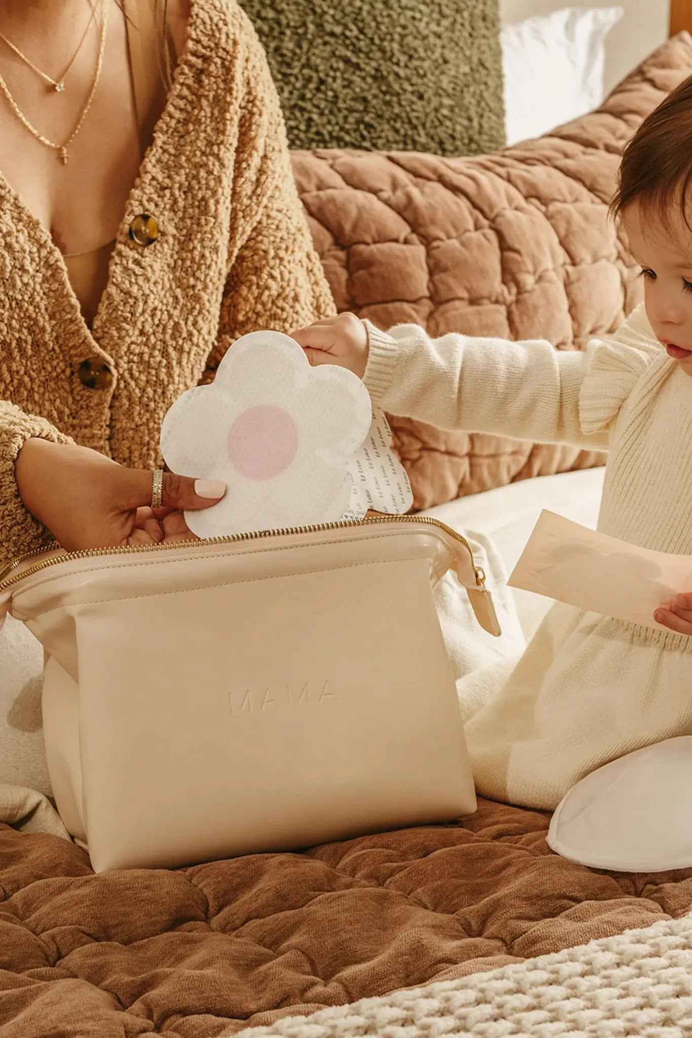 Le Lolo disposable nursing pads shown in individual packaging, designed for comfort and leak protection for nursing mothers.