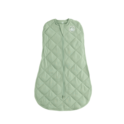 Dreamland Baby weighted sleep swaddle in soft fabric, designed to provide gentle, calming comfort for infants during sleep.