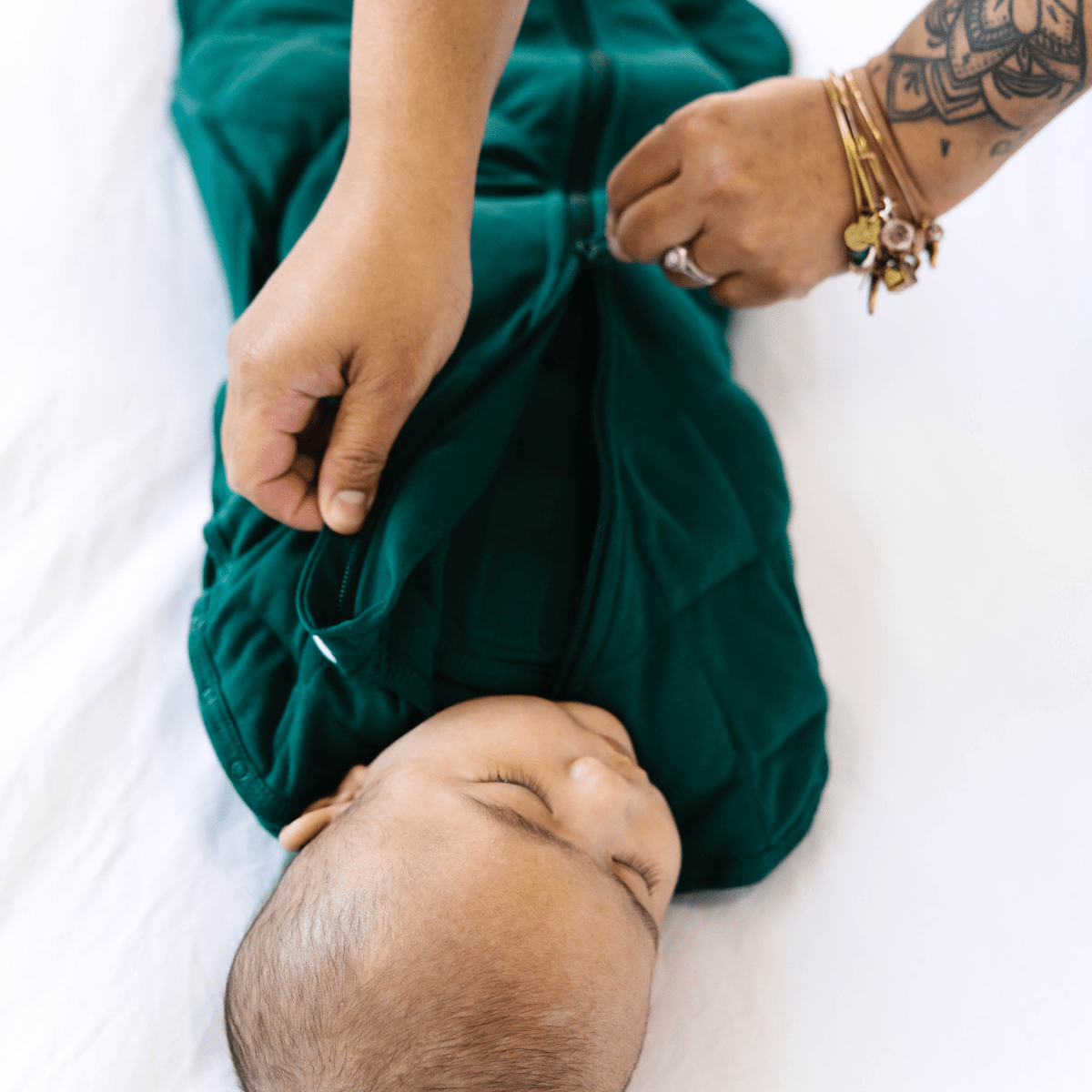 Dreamland Baby Dream Weighted Sleep Swaddle, soft fabric with secure wrap design for calming and comfortable sleep.
