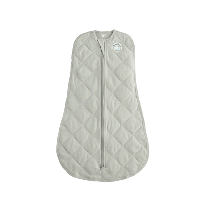 Dreamland Baby Dream Weighted Sleep Swaddle, soft fabric with adjustable wraps, designed to help babies sleep peacefully.