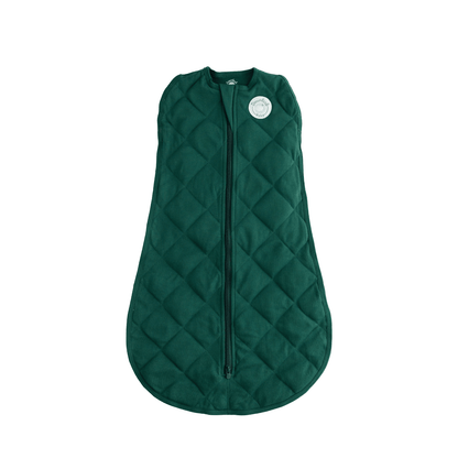 Dreamland Baby Dream Weighted Sleep Swaddle in soft fabric, securely wrapped around a sleeping infant for comfort and soothing.