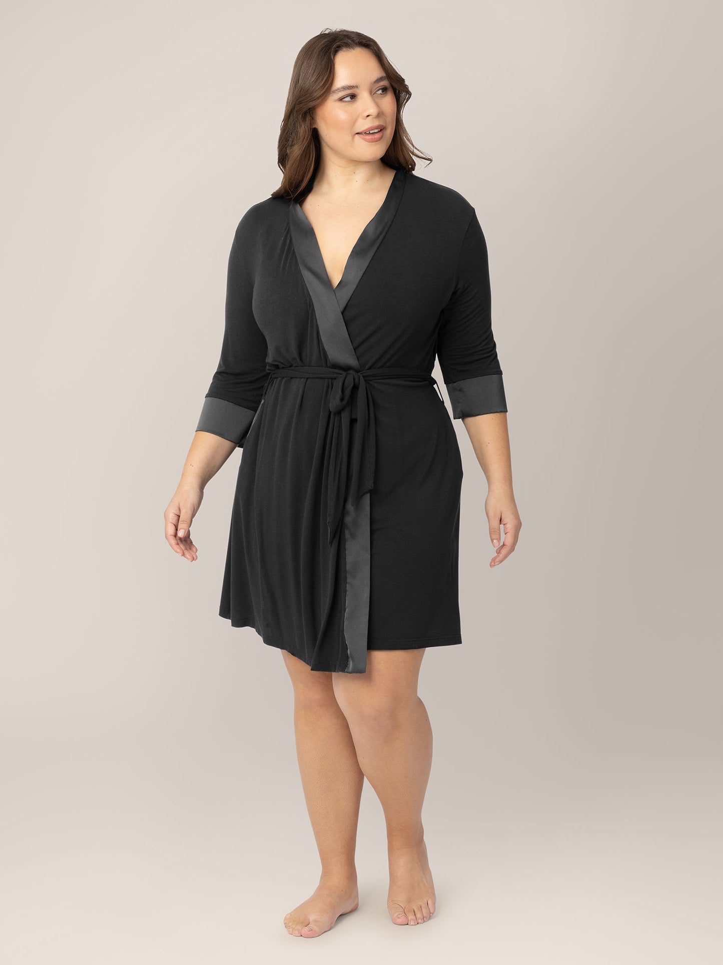Black Emmaline Robe by Kindred Bravely, shown hanging with soft fabric and relaxed fit for comfortable loungewear or sleep.