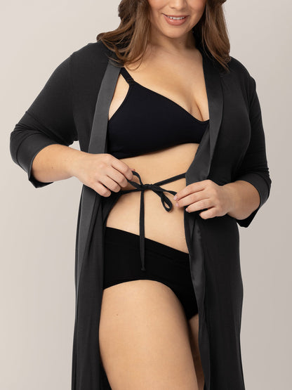 Black Emmaline Robe by Kindred Bravely, featuring soft fabric and a relaxed fit, displayed hanging with a tie waist detail.