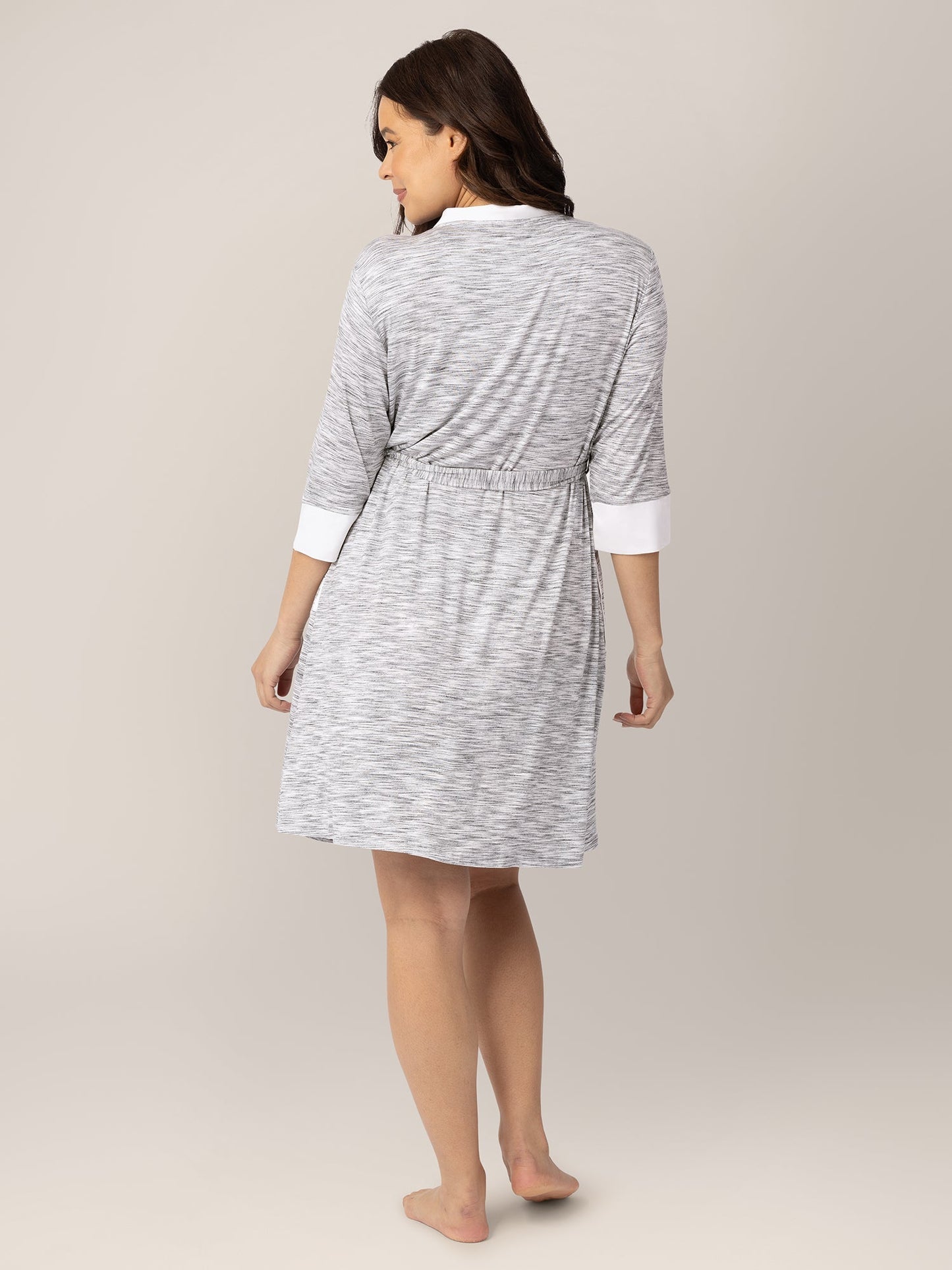 Grey Emmaline Robe by Kindred Bravely, soft and cozy with a relaxed fit, shown hanging on a wooden hook.