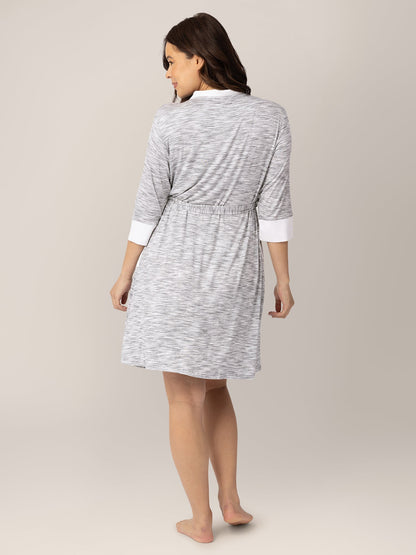 Grey Emmaline Robe by Kindred Bravely, soft and cozy with a relaxed fit, shown hanging on a wooden hook.