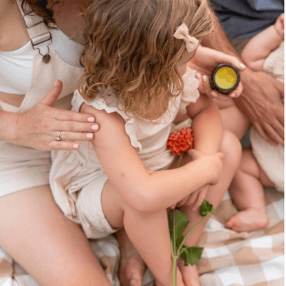 Baby skincare balm by Motherlove Herbal Company, showing a jar of Everyday Baby Balm with natural ingredients and product label.
