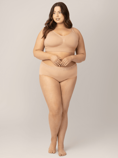 Set of high-waisted postpartum underwear from Kindred Bravely in assorted neutral colors, showcasing soft, comfortable fabric and fit.