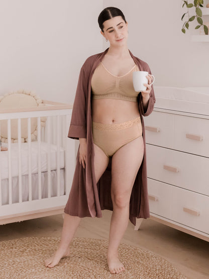 Set of high-waisted postpartum underwear by Kindred Bravely in assorted neutral colors, soft and comfortable for postpartum wear.