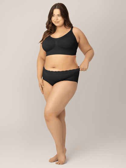 Set of high-waisted postpartum underwear by Kindred Bravely in assorted neutral colors, displayed laid flat.