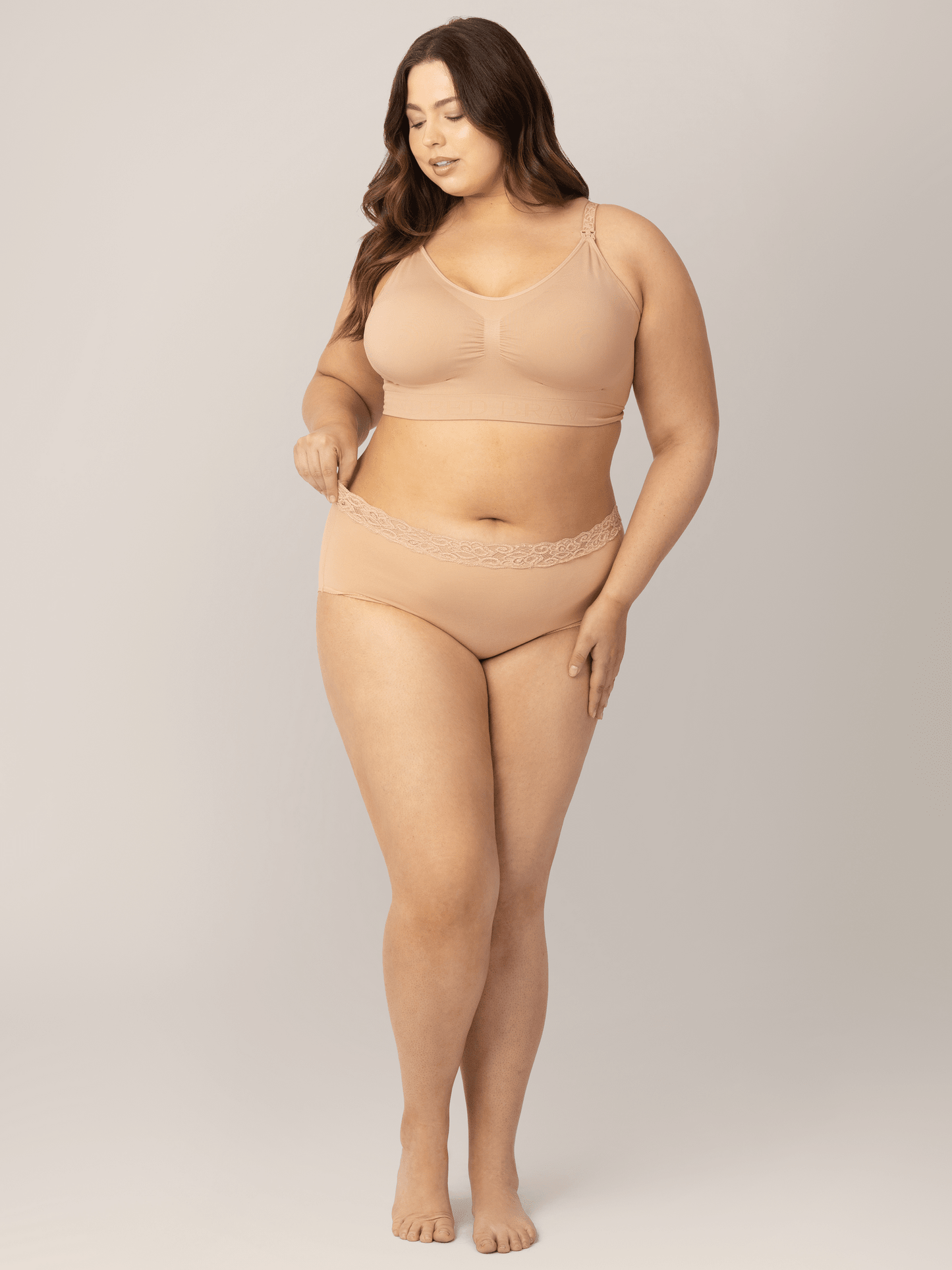 Set of high-waisted postpartum underwear from Kindred Bravely in assorted neutral colors, soft and comfortable for postpartum wear.