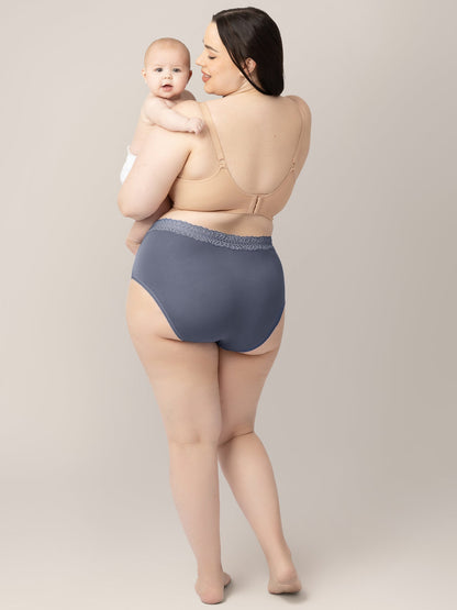 Set of high-waisted postpartum underwear in dusty hues by Kindred Bravely, showcasing soft, comfortable fabric and supportive fit.