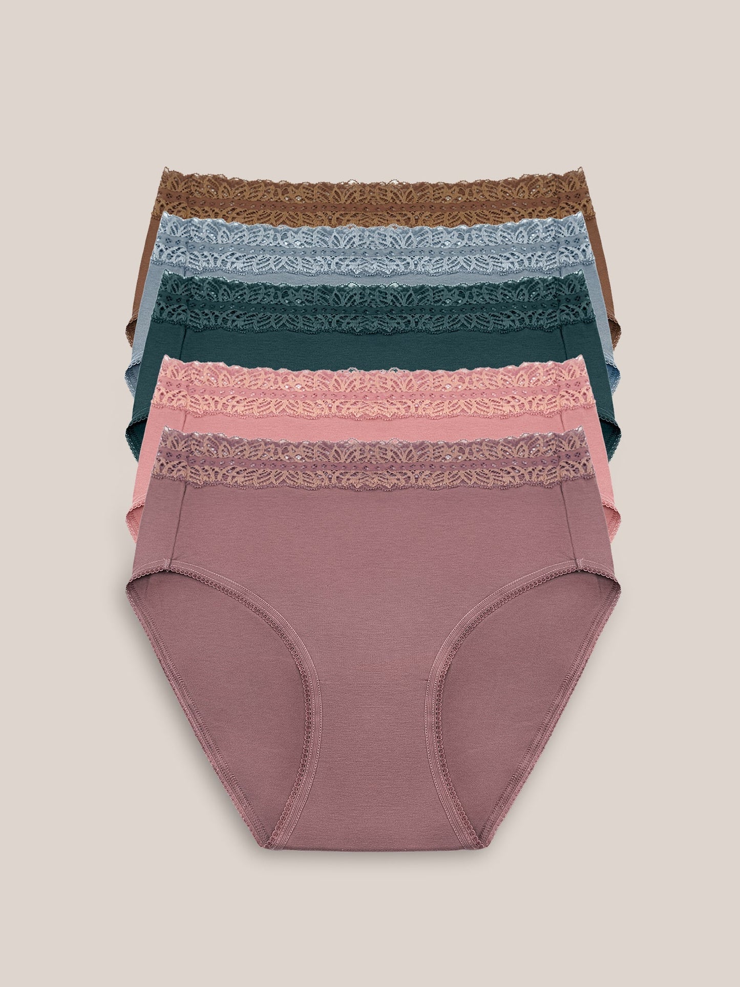 Set of high-waisted postpartum underwear in dusty hues from Kindred Bravely, shown in a pack with soft, comfortable fabric.