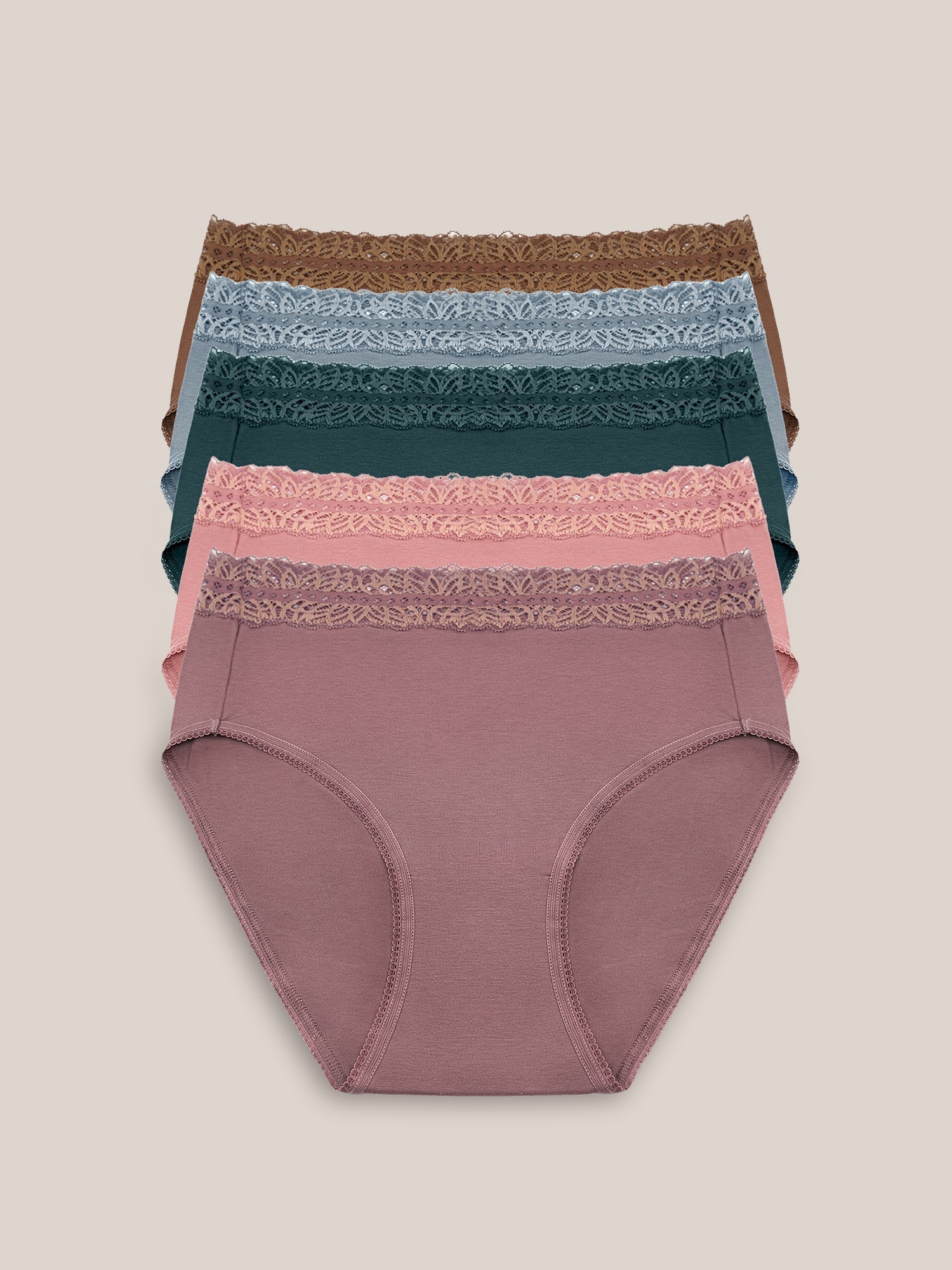 Set of high-waisted postpartum underwear in dusty hues from Kindred Bravely, shown in a pack with soft, comfortable fabric.
