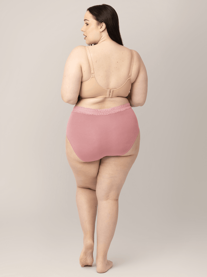 Pack of high-waisted postpartum underwear in dusty hues by Kindred Bravely, showcasing soft, comfortable fabric and supportive fit.
