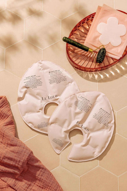 Le Lolo hot and cold breast therapy packs shown in use, designed for soothing relief and comfort.