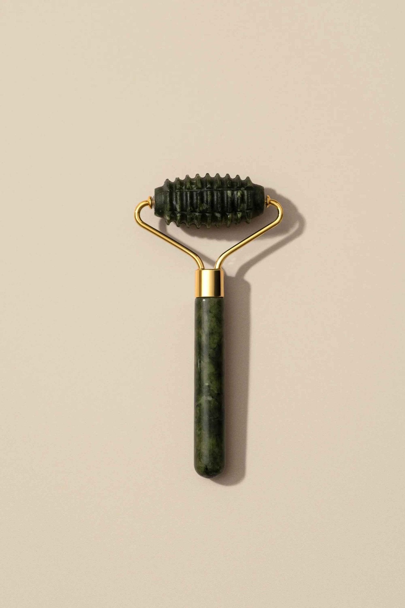 Le Lolo lactation jade roller with smooth jade stones for soothing breast massage and lactation support.