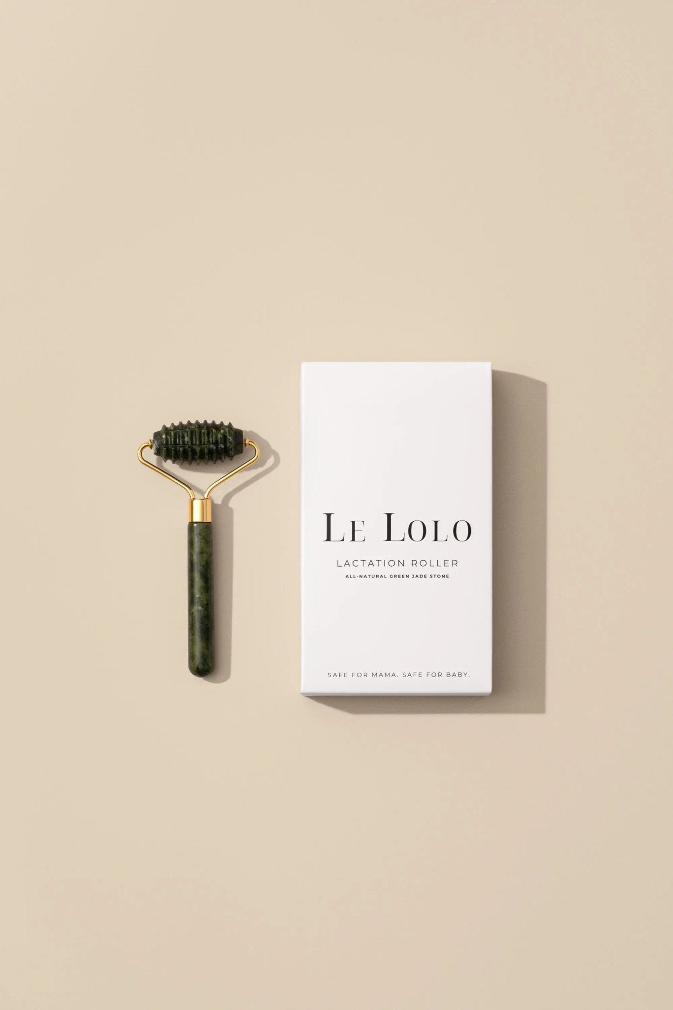 Le Lolo lactation jade roller for breast massage, featuring smooth jade stones and ergonomic handle for soothing relief.