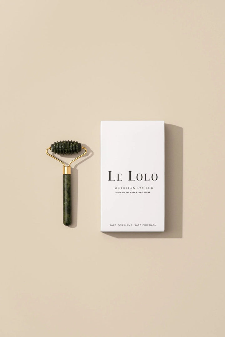 Le Lolo lactation jade roller for breast massage, featuring smooth jade stones and ergonomic handle for soothing relief.