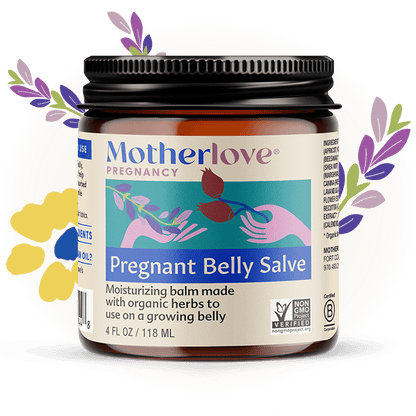 Pregnant belly with Motherlove Herbal Company Pregnancy Belly Salve applied to skin, showcasing natural skincare for expectant mothers.