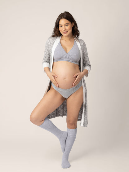 Pair of Kindred Bravely maternity compression socks in soft pink and grey Heather, designed for comfort and support during pregnancy.