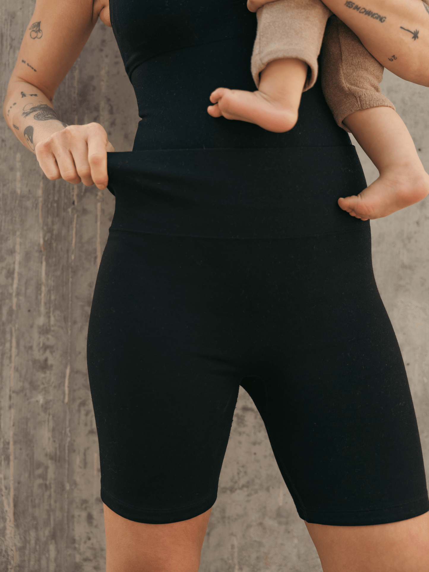Black Sublime® Bamboo Maternity and Postpartum Bike Shorts by Kindred Bravely, featuring comfortable stretch fabric and a fitted design.