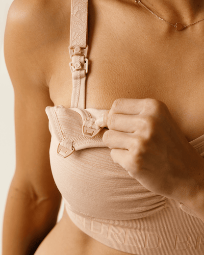 Beige Sublime® Hands-Free Pumping and Nursing Bra by Kindred Bravely, showing soft fabric and supportive design for breastfeeding.
