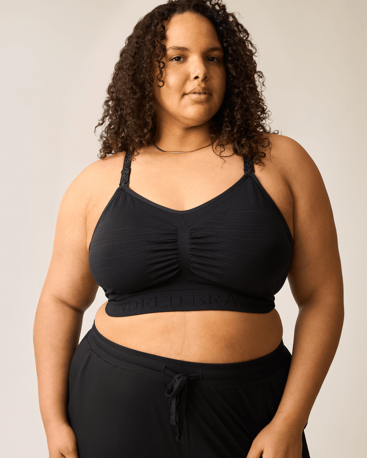 Black Sublime® Hands-Free Pumping and Nursing Bra by Kindred Bravely, shown worn with flexible cups and adjustable straps.