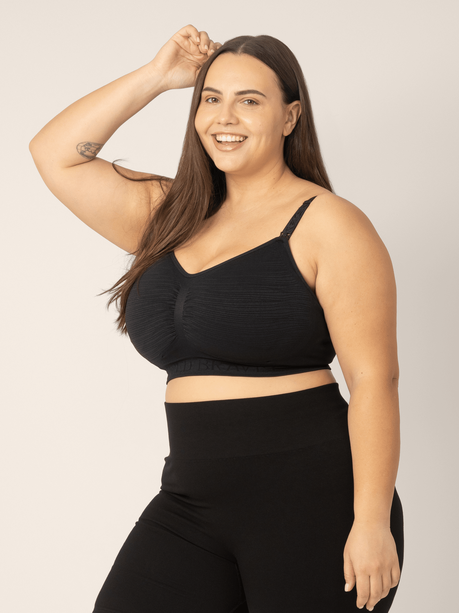 Black Sublime® Hands-Free Pumping and Nursing Bra by Kindred Bravely with adjustable straps and supportive design for breastfeeding.
