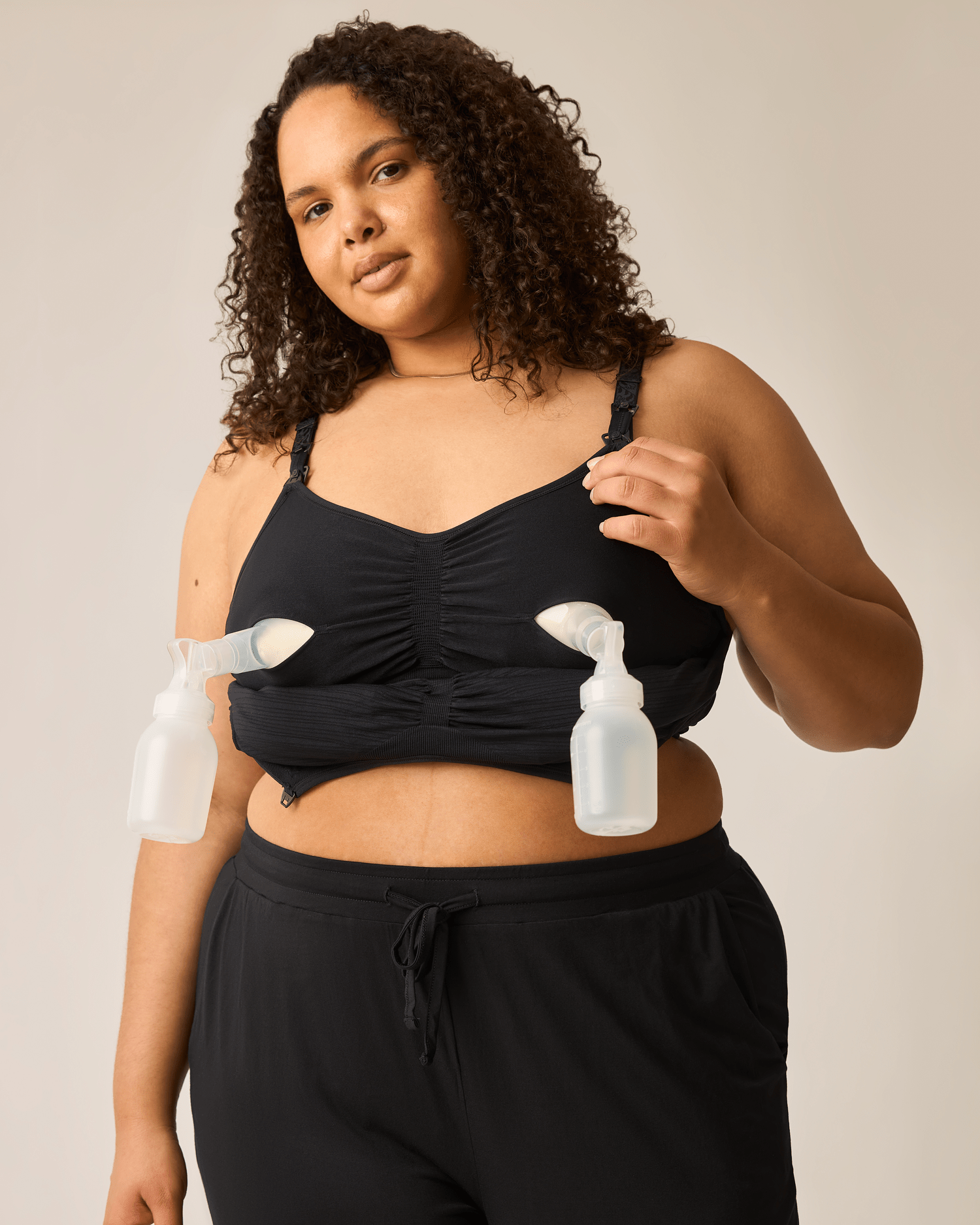 Black Sublime® Hands-Free Pumping and Nursing Bra by Kindred Bravely, showing the comfortable, adjustable bra with supportive design.