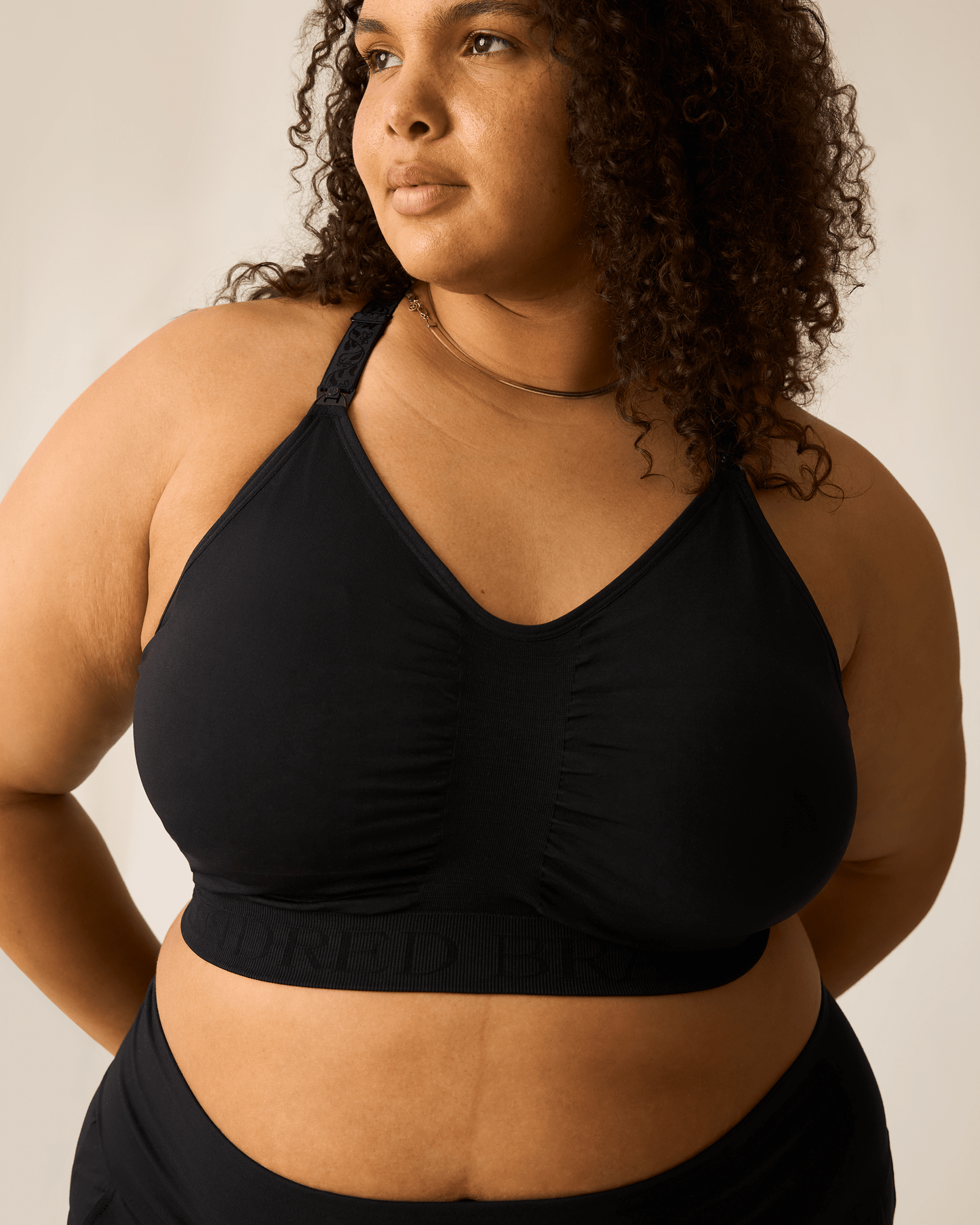Black Sublime® Nursing Sports Bra by Kindred Bravely with supportive design and adjustable straps, suitable for active nursing moms.